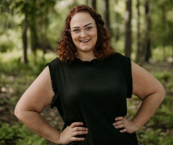 Headshot of Sarah Christopher, QC Event School graduate, certified event and wedding planner, and owner of Cheers & Champagne.