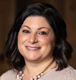 QC Event School graduate Carisa Lockery smiling in a professional headshot.