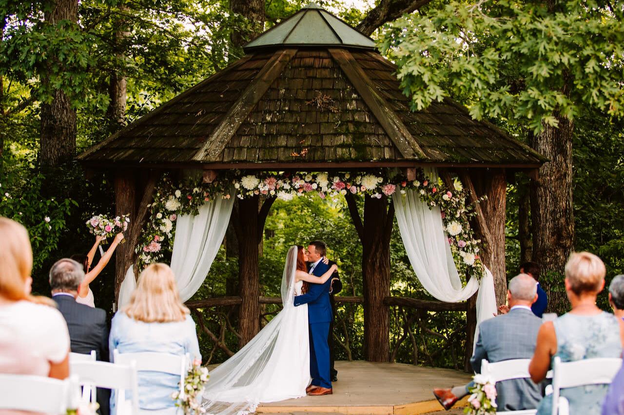 Outdoor gazebo wedding ceremony surrounded by lush Minneapolis nature scenery