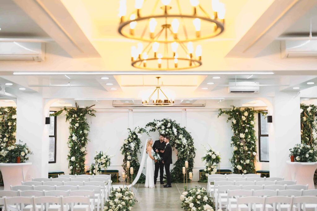 Indoor San Diego wedding reception venue with greenery