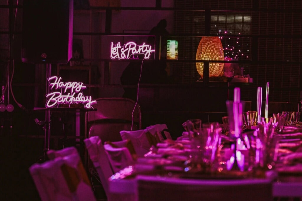 Indoor neon sign event venue styled by creative party planners in New York