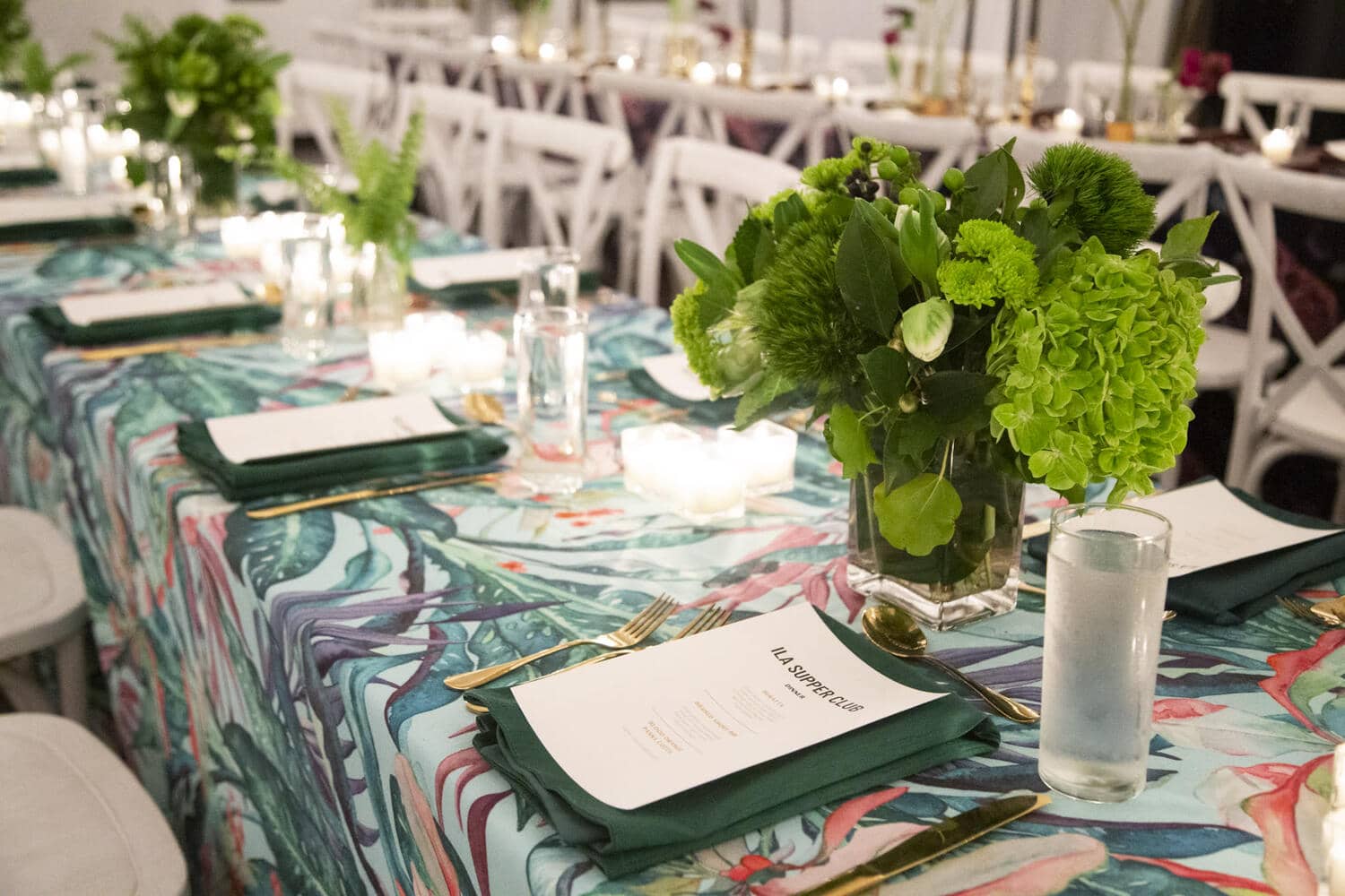 Tropical themed wedding reception table setting perfect for Florida wedding planners