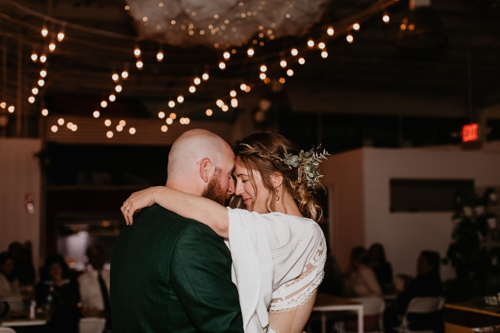 Bride and groom sharing intimate first dance at Detroit wedding