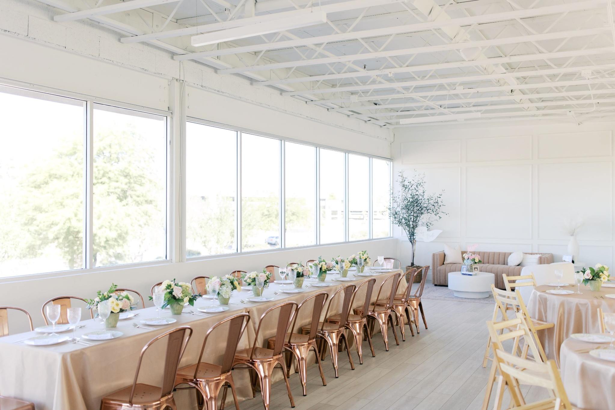 Bright modern indoor event space set for a Scottsdale wedding reception