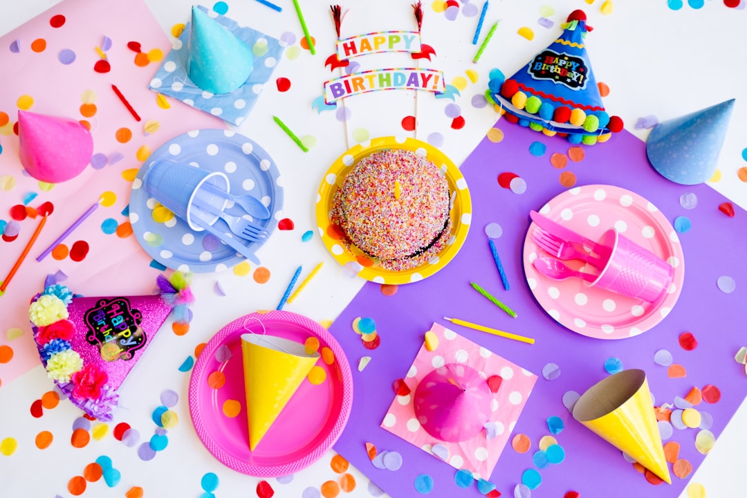 Colorful and creative birthday decorations set up for a celebration, featuring balloons, streamers, and DIY elements.