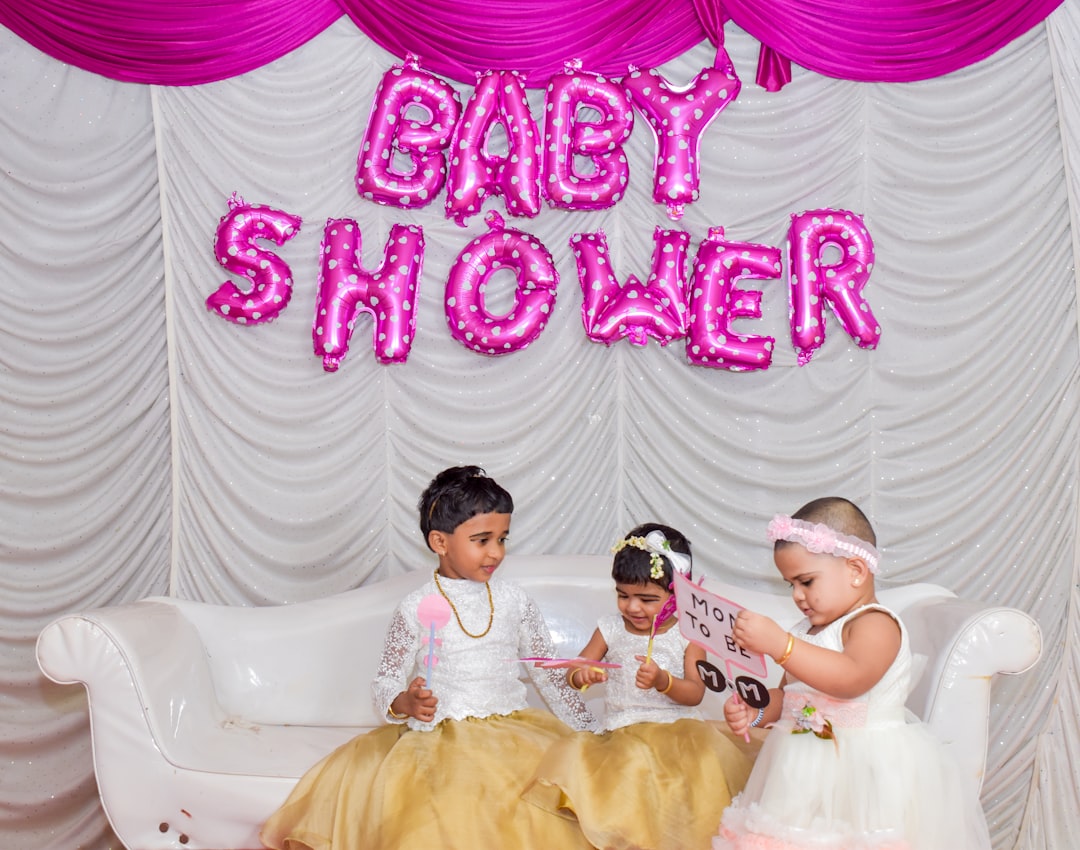 Colorful decorations for a child shower and bridal shower, featuring balloons, banners, and table settings that create a festive atmosphere.